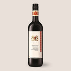 Flasche Aus’m Ländle Rotwein der WZG mit hellem Etikett vor neutralem Hintergrund.