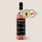 Flasche Rebenschätze Schwarzriesling Roséwein der WZG mit mehreren sichtbaren Wein-Auszeichnungen.
